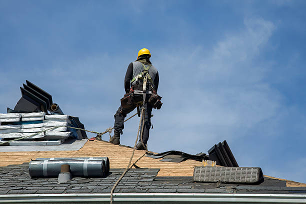 Professional Roofing technician working in Jericho, NY